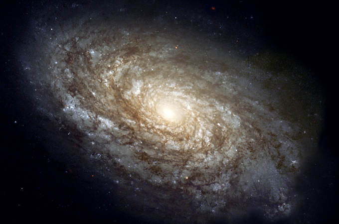 Das Foto zeigt zwar eine andere Galaxie, doch so ungefähr dürfte auch unsere Milchstraße aussehen. 
Bild: NASA, ESA, STScI